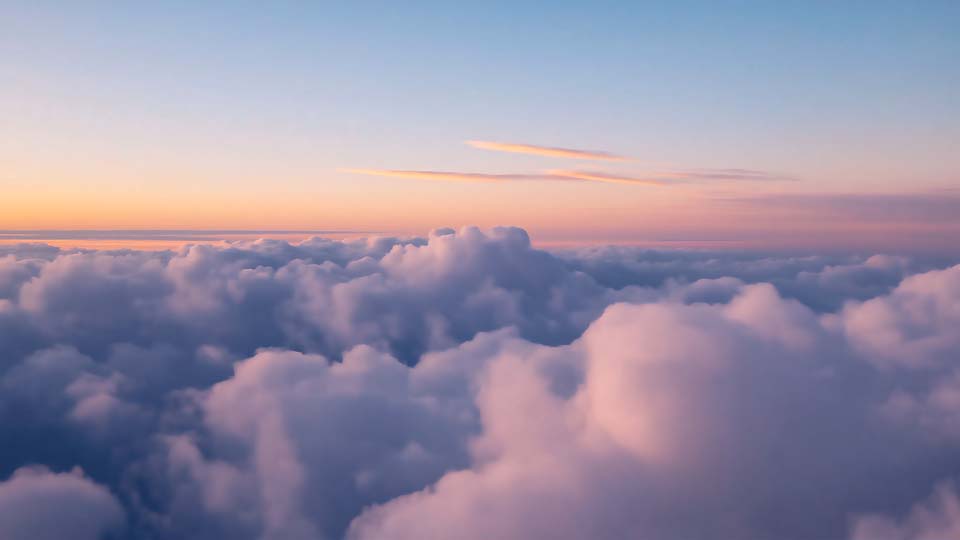 Aerial view of the sky with clouds at dawn