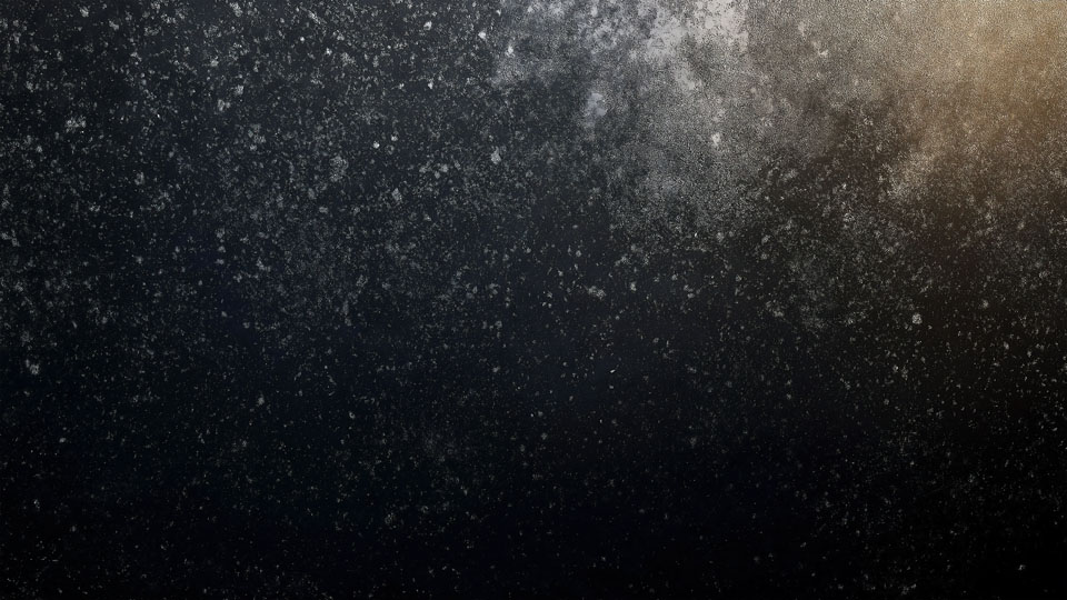 Dark background, white powder falling from the sky