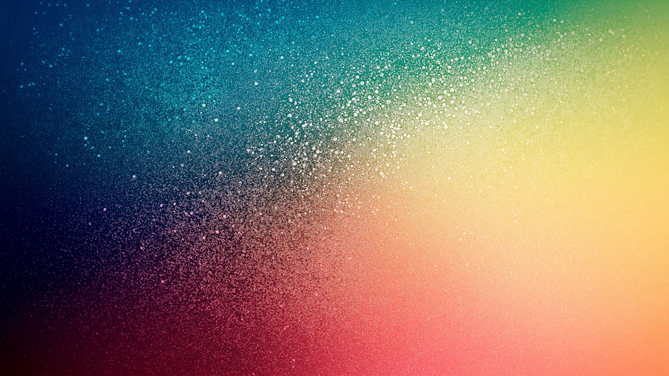 Colorful gradient with a grainy texture and sparkling particles