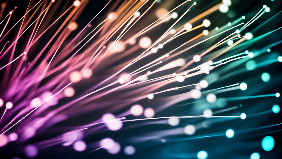 Fiber optic cables illuminated by bokeh lights