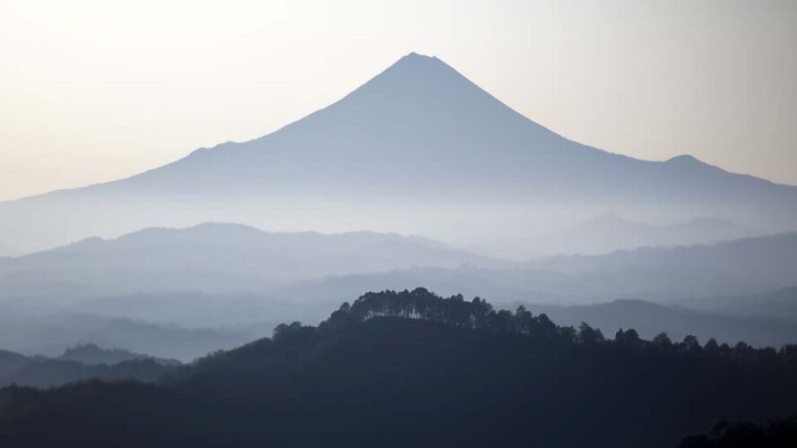 Silhouette of the volcano peak against a clear sky