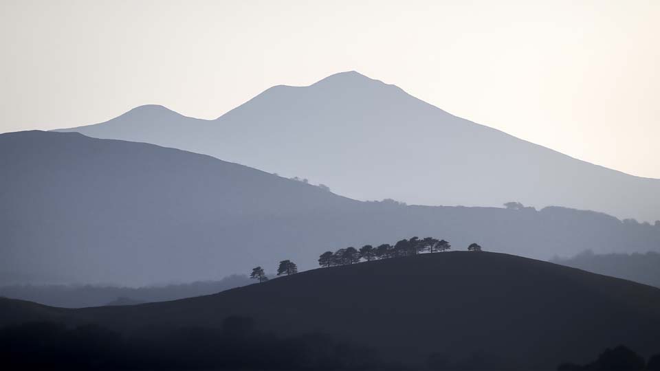 Silhouette of the volcano peak against a clear sky