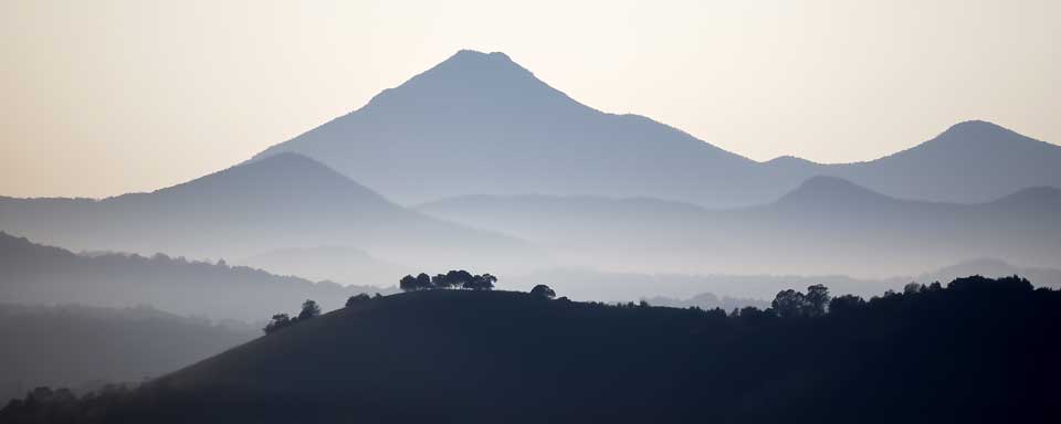 Silhouette of the volcano peak against a clear sky