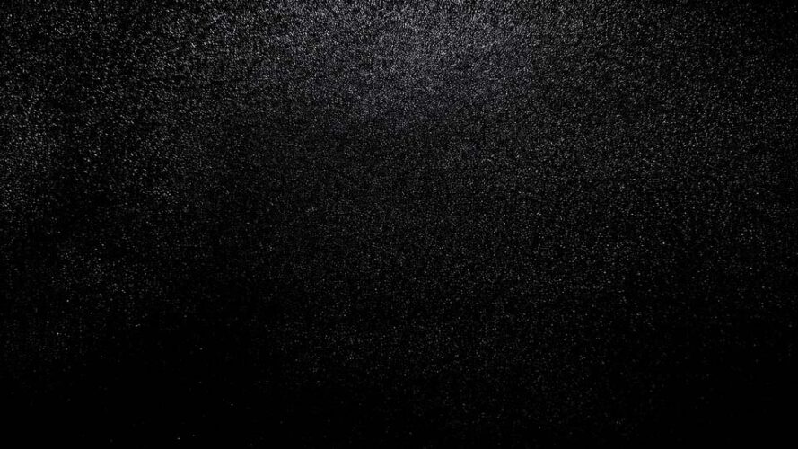 Black background with a grainy texture