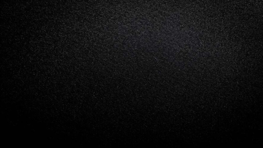 Black background with a grainy texture