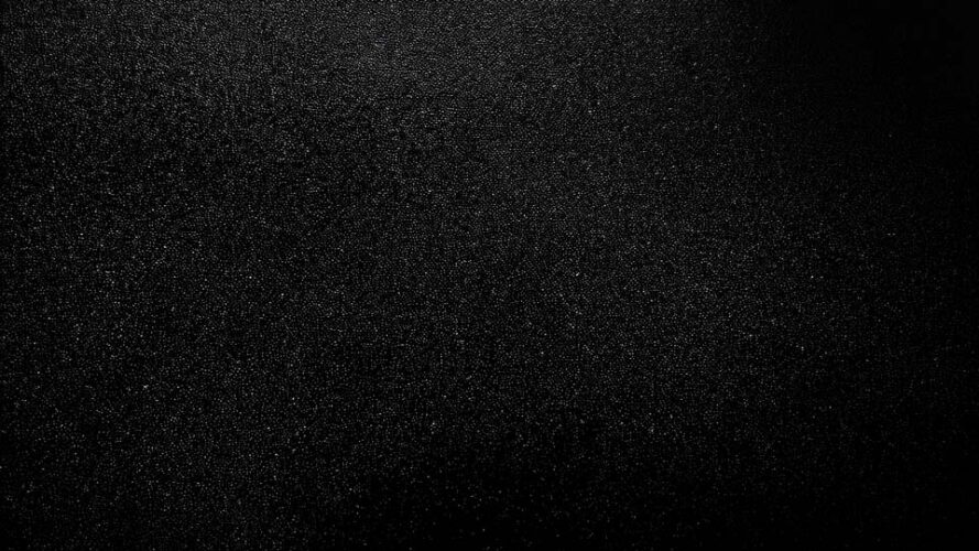 Black background with a grainy texture
