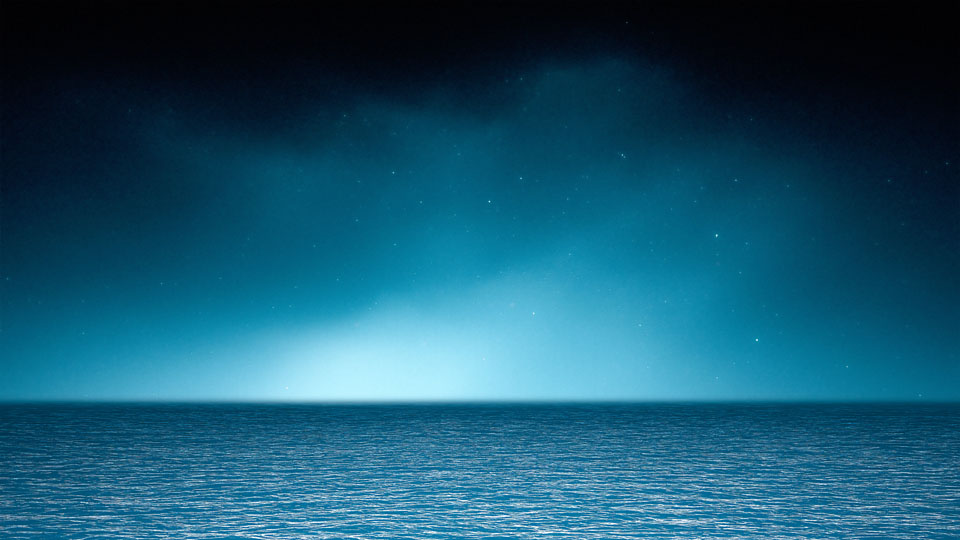 Blue ocean horizon at night