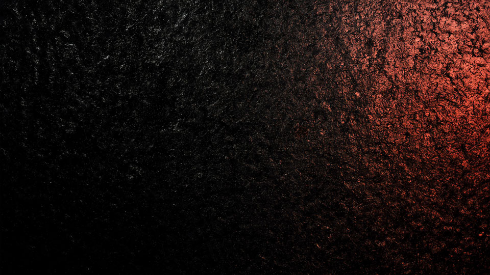 Black background with rose gold powder particles