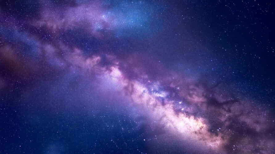 Milky Way night sky with purple and blue hues