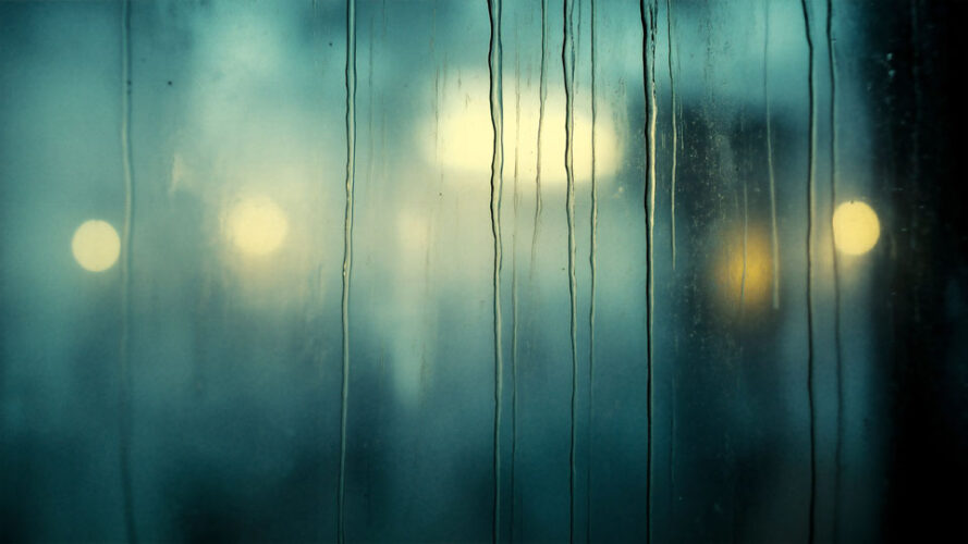 Double exposure of rain and city lights