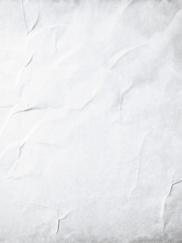 Detailed white crumpled paper, soft lighting