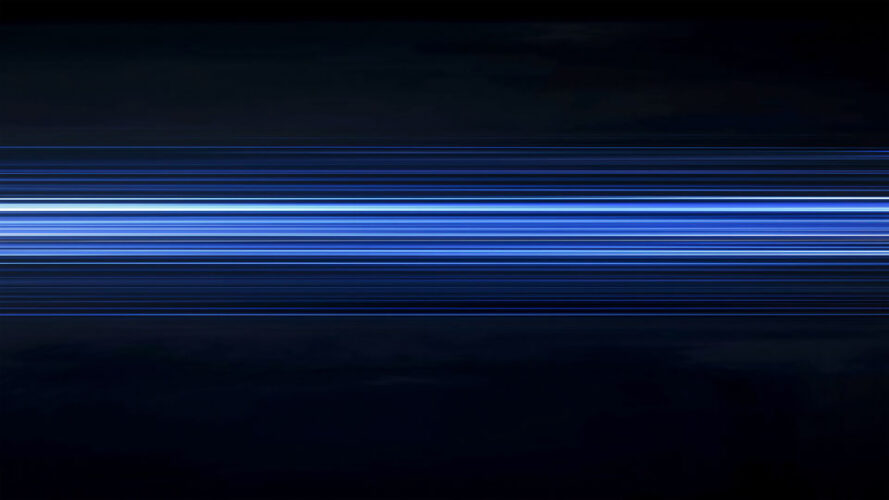 Abstract blue light streaks on black